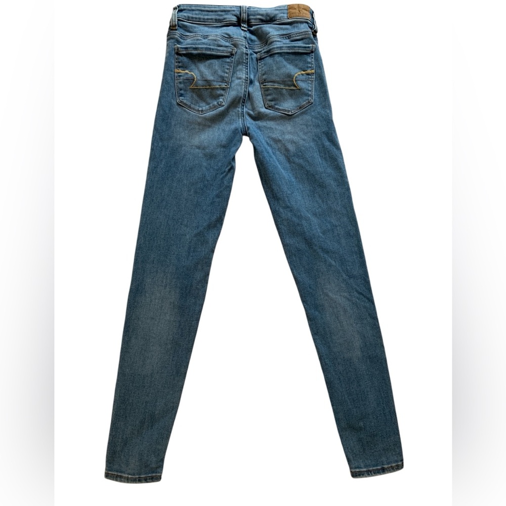 American Eagle Outfitters Blue Skinny Jeans with Gold Stitching.  Size 2 reg.
